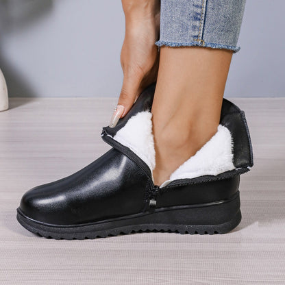 Bottines d'hiver en cuir pour femmes, élégantes et tendance.