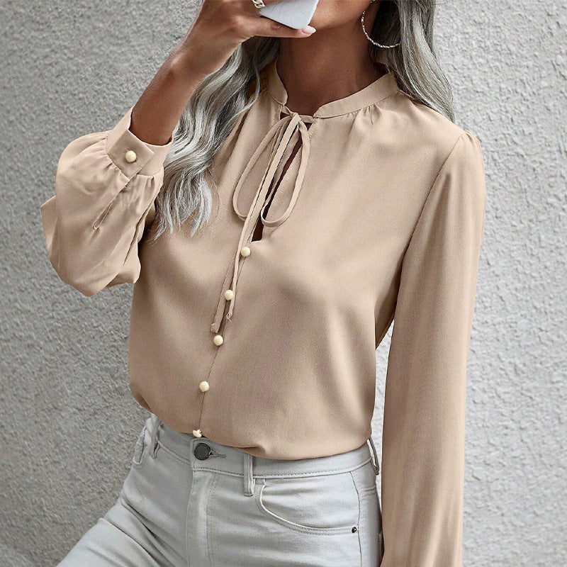 Chemise à col lacé à manches longues pour femmes - Élégance et style intemporel.