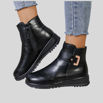 Bottines d'hiver en cuir pour femmes, élégantes et tendance.